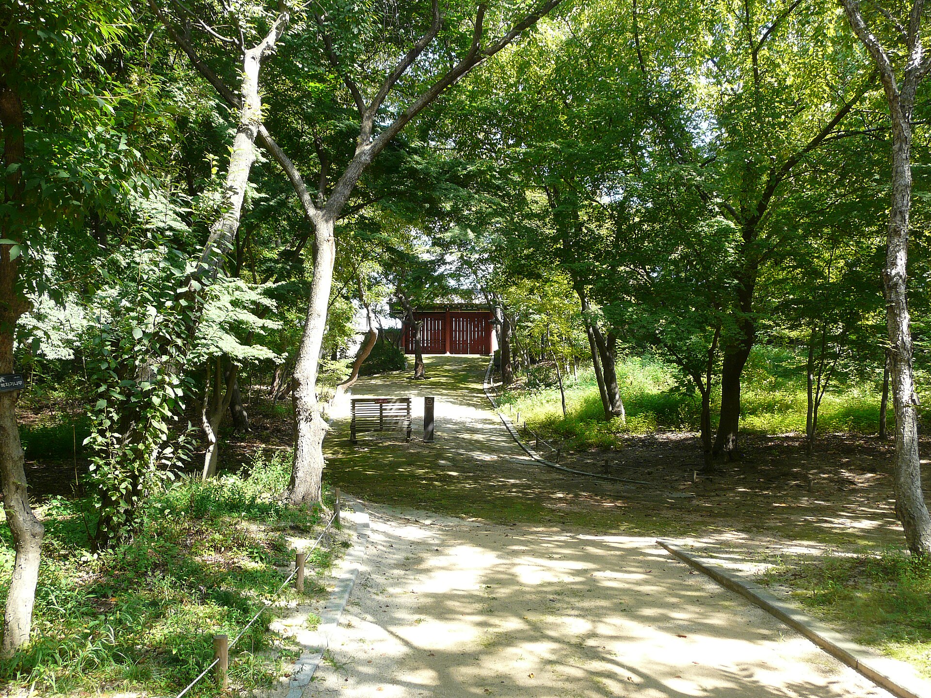 A wooded palace path in an archival photograph.