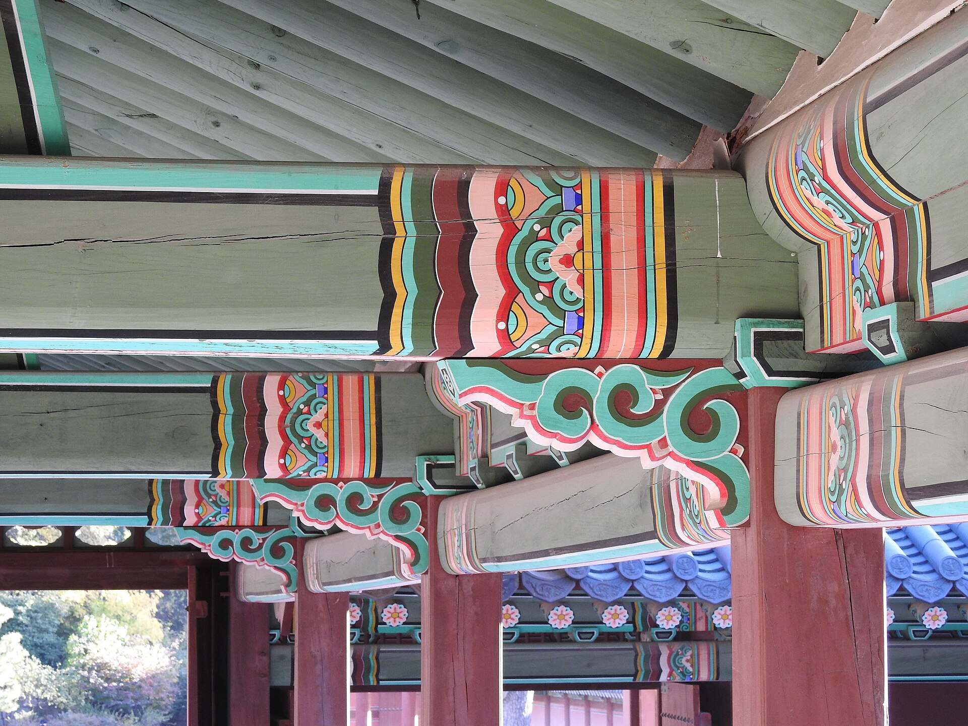 Painted detail beneath the roof.