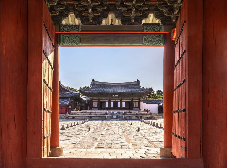 Myeongjeongjeon framed by a palace gate.