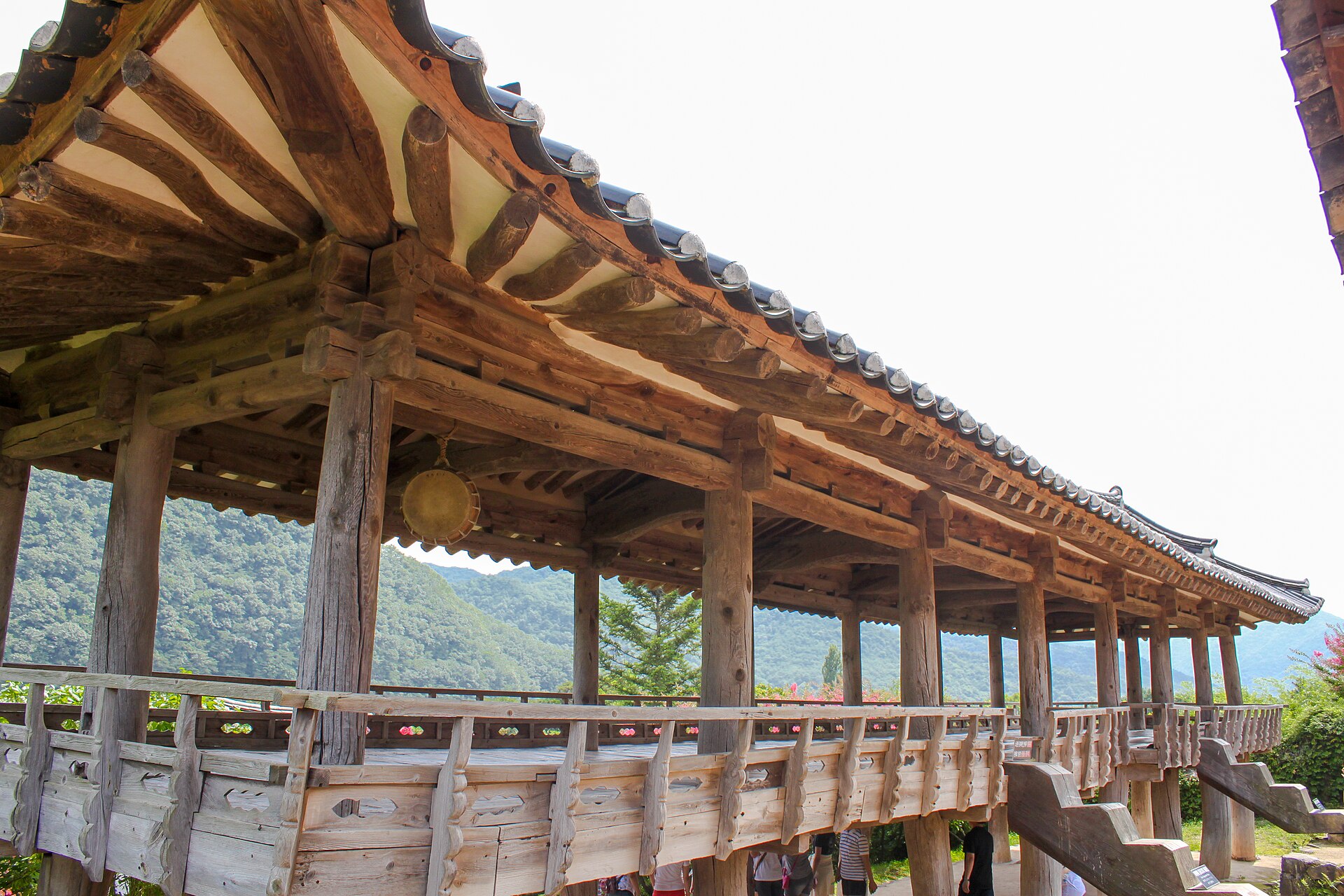 Wooden columns and beams beneath Mandaeru pavilion